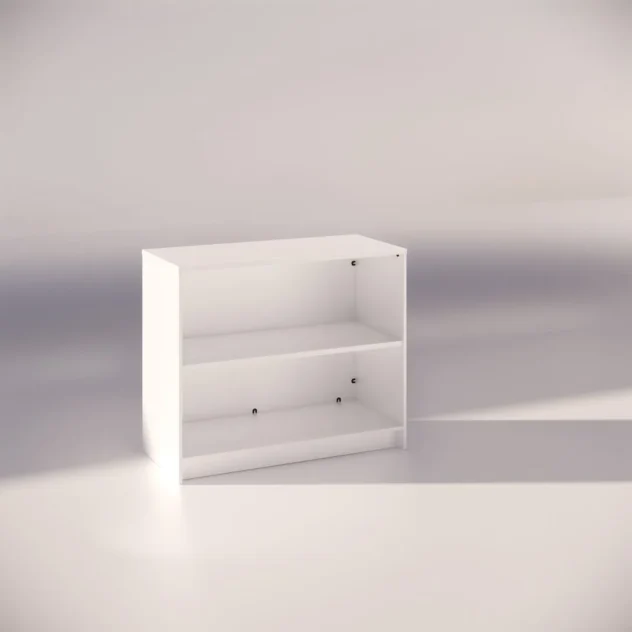 A white, two-shelf bookcase is placed in a softly lit room with a smooth, light-colored floor. The simple, modern design of the bookcase is empty, highlighting its sleek lines and minimalist style.