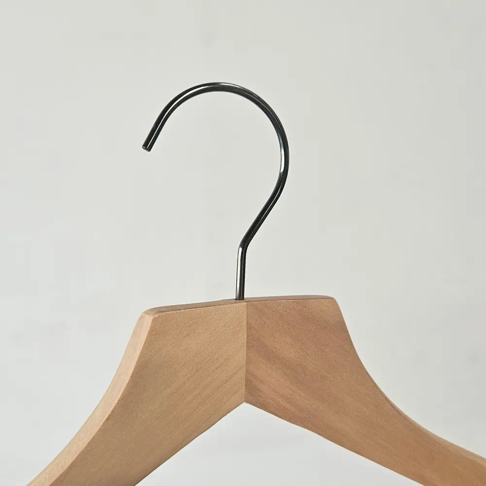 The 445mm Natural Timber Contoured Wishbone Hangers, featuring a metal hook, are showcased against a plain white background.